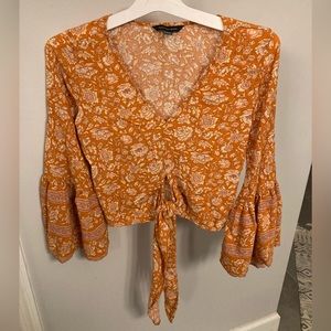 American Eagle orange and cream xs floral boho long sleeve crop top 70’s style
